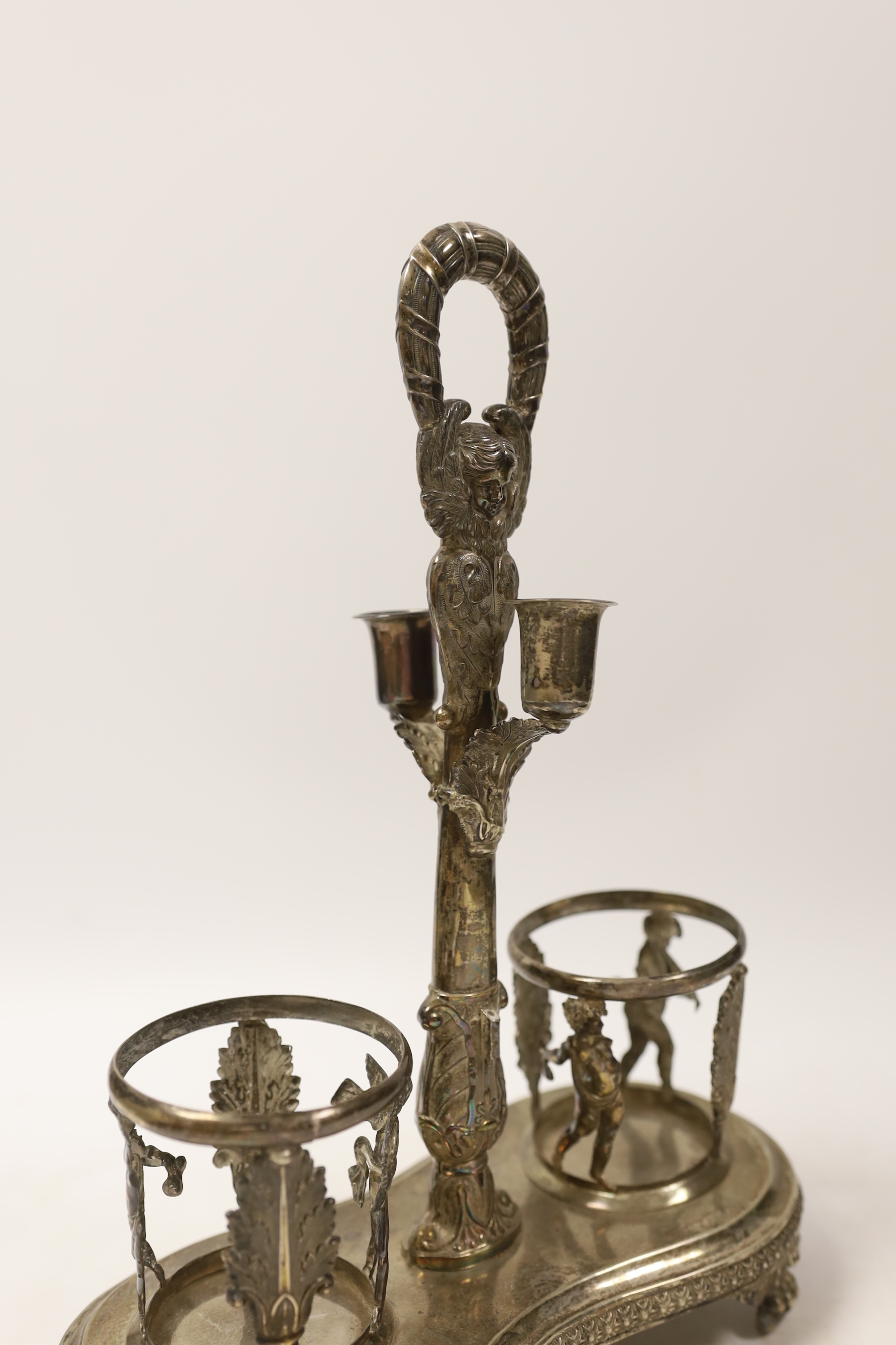 A 19th century Italian? white metal Empire style oil and vinegar stand, eight 31.5cm, 11.8oz.